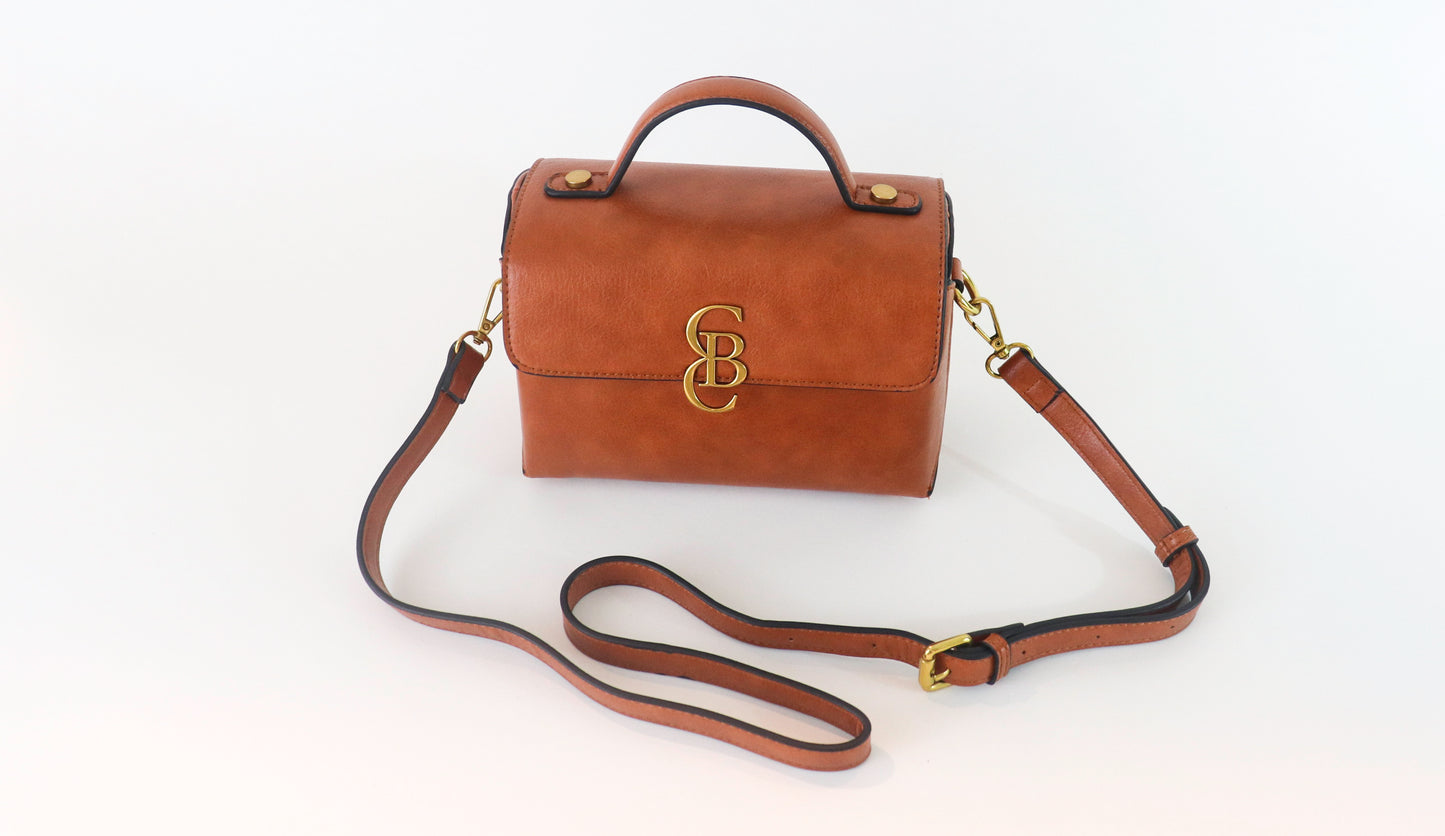 TREASURE TOP HANDLE CROSSBODY SATCHEL COGNAC